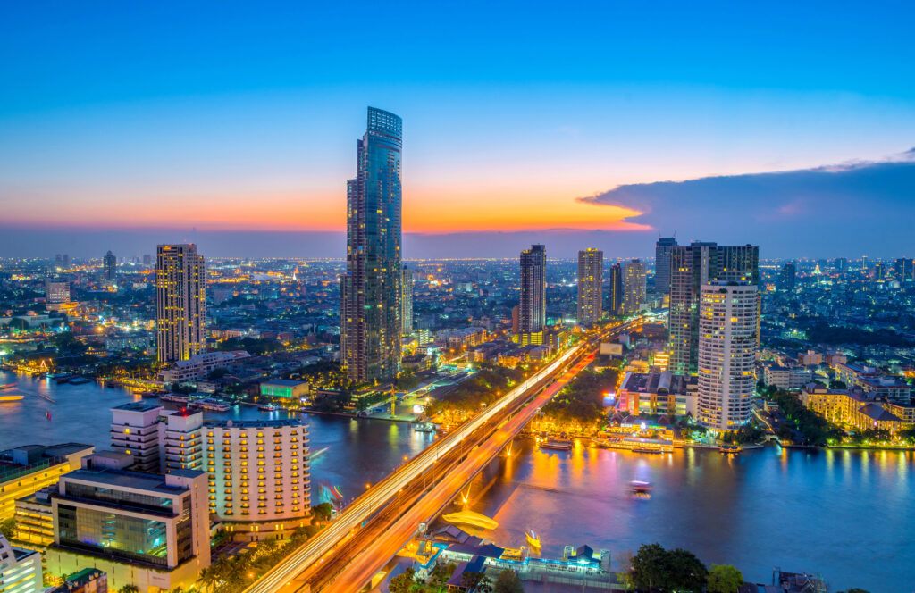 Landscape of river in Bangkok cityscape in night time.